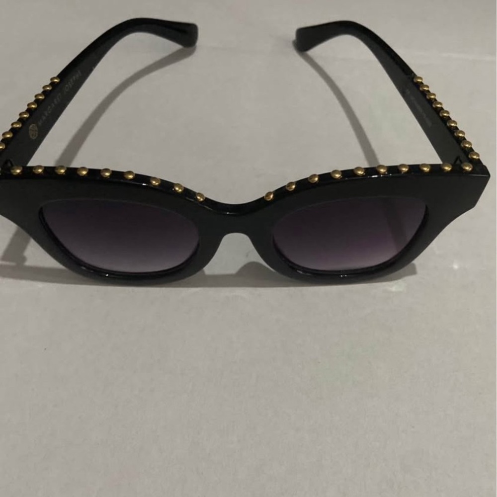 Elegant Black Sunglasses with Gold Accents